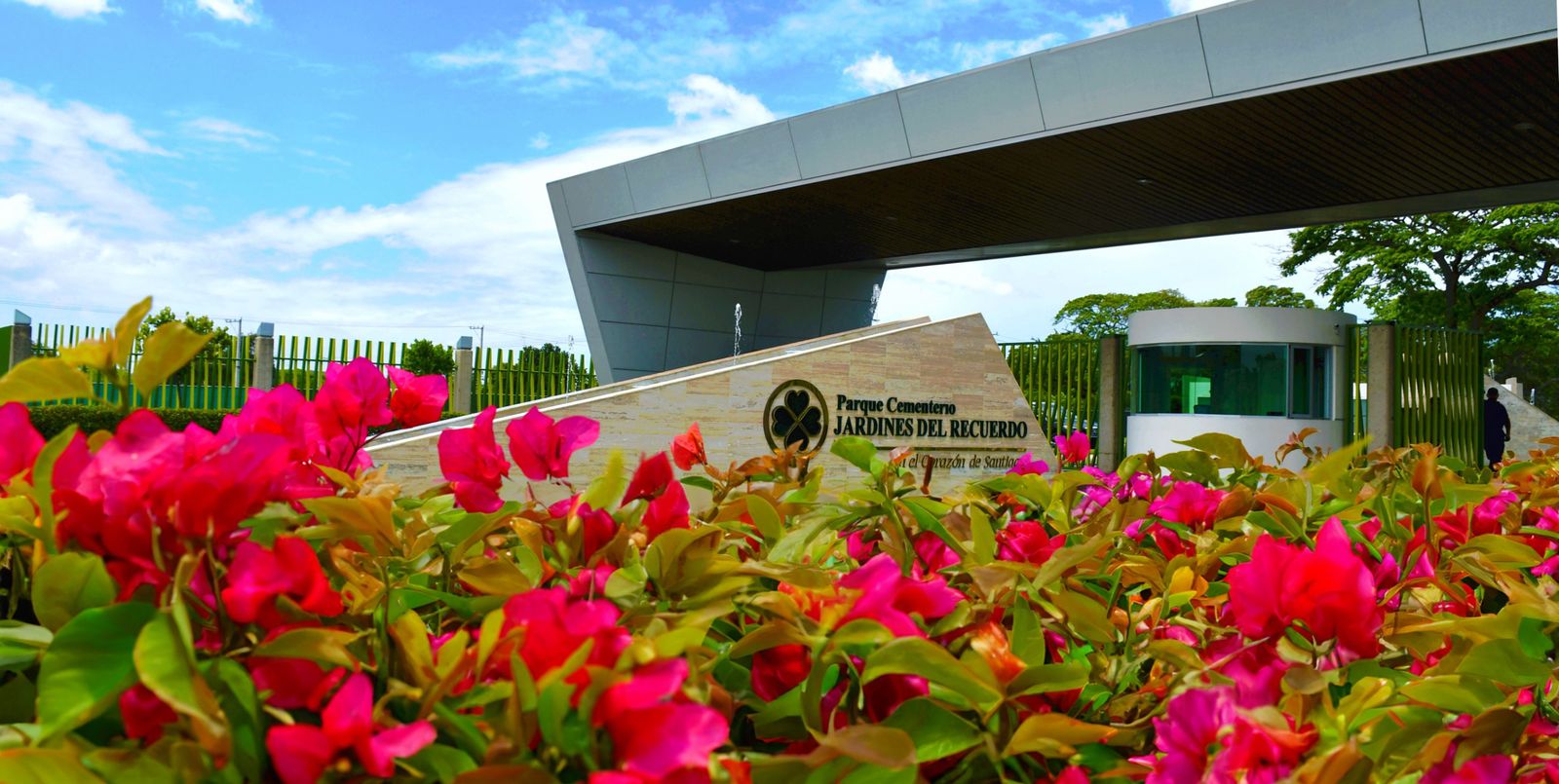 A modern building with green surroundings